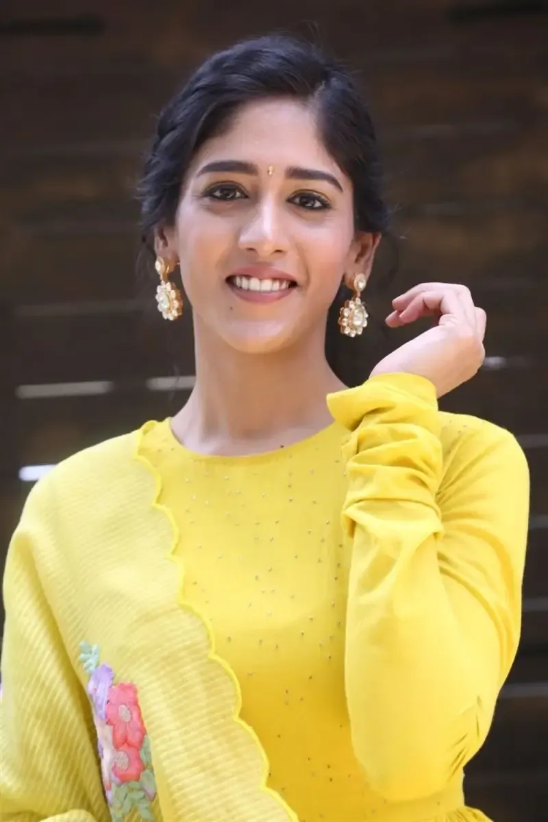 ACTRESS CHANDINI CHOWDARY IN YELLOW DRESS AT MOVIE TEASER LAUNCH 6